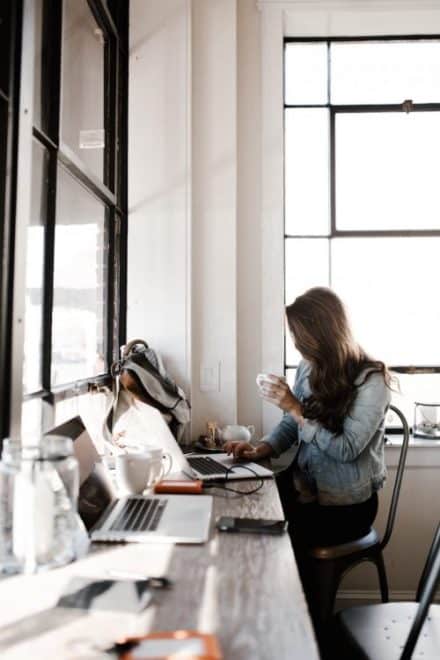 Woman working remotely from her home office
